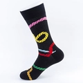 Mid-calf black cotton socks featuring vibrant colorful rope pattern on a white foot model - EU 40-46 / Black Multi-color Rope