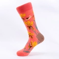 Coral pink mid-calf cotton socks with yellow iris flower and small white snail design - Coral Pink Snail Floral