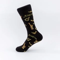 Calcetines negros artísticos con instrumentos musicales dorados y puños acanalados - EU 40-46 / Patrón de Instrumentos Musicales