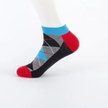 Men's low cut cotton socks featuring blue and red Argyle diamond pattern on foot - Dark Grey Argyle