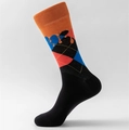 Classic Argyle crew socks featuring orange cuffs with blue and red geometric diamond patterns - Orange Trim Argyle