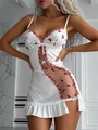 Detailopname van witte satijnen jurk met bloemen kersenborduursel en kanten patchwork - S / Wit