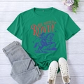 Detail of green T-shirt with Red White and Rowdy western rider print on wood background - Dark Green