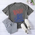 Flat lay of retro Red White & Rowdy graphic tee with blue jeans and white sneakers - Dark Gray