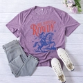 Detail of vintage cowboy horse print on purple cotton t-shirt with classic crew neck - Purple