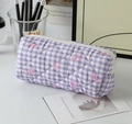 Detailed view of purple gingham quilted pencil case with soft pink ribbon patterns - Purple Gingham Bow