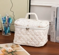 Quilted floral makeup bag with cream cotton fabric and top handle for travel storage - Large Handheld