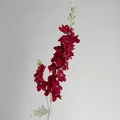 Artificial delphinium flower in deep red velvet finish with green buds for home decor - Red