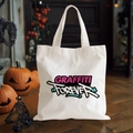 Close-up of white canvas tote bag with GRAFFITI FOREVER print and pumpkin decor - GRAFFITI Street Graffiti Letter Style(14)