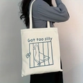 Detailed side view of off-white canvas tote bag with 'Got too silly' duck illustration - Duck in Cage Fun Text Style(8)