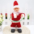 Electric swaying Santa Claus toy with pink and green hula hoops in festive setting - Hula Hoop Santa Claus