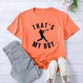 Orange That's My Boy baseball t-shirt with crew neck and XXL size tag on wood floor - S / Orange (Black Font)