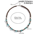 Retro beaded skull necklace with dark brown wood disks and turquoise accents - Green Skull