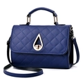 Deep blue quilted leather handbag with gold teardrop clasp and crossbody strap - Dark Blue