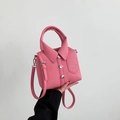 Pink shirt-shaped handbag in lychee texture leather with crossbody strap and silver buttons - 19*6*17 / Pink