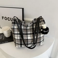 Black and white plaid tweed tote bag with faux fur monster charm for daily commute - Black With Black Fur Ball Monster Charm