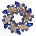 Exquisite gold-tone floral wreath brooch featuring deep blue and white crystals - Light Royal Blue Wreath Style