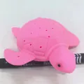 Pink turtle-shaped sensory water toy made of soft silicone material for children - Pink Bath Turtle Toy