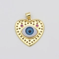 Ciondolo a cuore dorato con malocchio, cornice traforata e dettagli blu intenso - Malocchio Blu Brillante Motivo Cuore (Stile G)