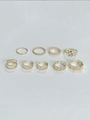 Detailed set of nine bohemian style gold metal rings with hollow and braided patterns - Crown Leaf Hollow Out Style (7)