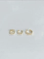 Detailed macro view of three golden open adjustable rings with geometric patterns - Greek Key Wave Disc Style (4)