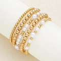 Five-piece beaded bracelet set featuring gold metal beads and white faux pearls - Mirror Finish Metal Bead Style (6174401HB)
