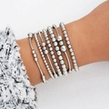 Minimalist silver beaded bracelet set with multiple elastic layers worn by model - Elastic Minimalist Combo (6222801HB)