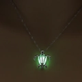 Luminous turtle pendant necklace with glowing green bead and silver alloy hollow frame - Yellow-Green Luminous Turtle (NY092)