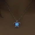Luminous turtle pendant necklace with glowing blue bead in a hollow silver cage - Sky Blue Luminous Turtle (NY091)