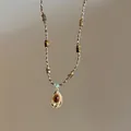 Collier vintage doré avec pendentif goutte, pierre œil de tigre et chaîne perlée - 4# Style Goutte Or Brun