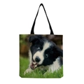 Detailed close-up of canvas tote bag texture with cute puppy print and black handles - Border Collie Puppy (hm5155)