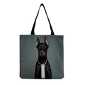 Detail of grey canvas tote bag featuring a high-definition Doberman Pinscher photo print - Doberman with Necklace (hm5157)