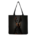 Close-up of a black canvas tote bag featuring a realistic Doberman dog head print - Black Doberman with Chain (hm5165)