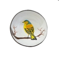 Detail of handcrafted coconut shell bowl featuring a yellow bird painted on white coating - Bird Style