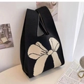 Chic black knitted tote bag featuring a large cream bow pattern and knot handle - 20*35cm / Black & Cream Bow