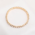Elegant gold plated tennis bracelet featuring a single row of sparkling round zircons - Single Row KC Gold