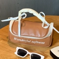 Trousse à maquillage en cuir marron avec nœud à la poignée et broderie détaillée - Petit / Café