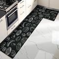 Black kitchen floor mat set with white bakery patterns in a modern L-shaped kitchen - 44cmx75cm / Dessert Graffiti