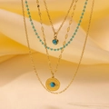 Böhmische goldene Schichtkette mit Türkisperlen und Sonnenstrahl-Münzanhänger - Runder Türkis Mehrlagiger Stil (H1016) / Gold