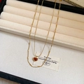 Elegant double-layered gold necklace with a dainty red heart pendant for women - Necklace / Red