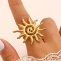 Bohemian gold hollow sun ring with spiral pattern and hammered metal texture for women - Titanium Ring