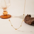 Elegant 18K gold plated titanium necklace with heart charms and black bead accents - Black and White Zircon Heart (H1012) Gold