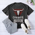 Dark grey t-shirt with cowboys and beer print paired with jeans on wood background - S / Heather Gray (White Font)