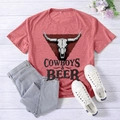 Red Cowboys & Beer graphic t-shirt with cattle skull print on rustic wood background - S / Rose Gold (Black Font)