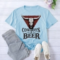 Light blue women's t-shirt with cowboys beer cattle skull print in casual loose fit - S / Light Blue (Black Font)
