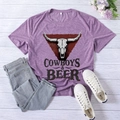 Purple Cowboys & Beer graphic tee in a relaxed fit with a vintage bull skull print - S / Purple (Black Text)