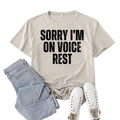 Beige cotton t-shirt with Sorry I'm On Voice Rest print, styled with jeans and sneakers - S / Sand (Black Font)