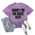 Purple crew neck T-shirt with 'Sorry I'm On Voice Rest' slogan in a flat lay style - S / Purple (Black Text)