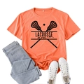 Orange Lacrosse Mom graphic t-shirt with cross sticks paired with denim and sneakers - Orange (Black Font)
