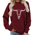 Burgundy long sleeve crewneck sweatshirt featuring a white bull skull graphic for women - S / Wine Red (White Font)